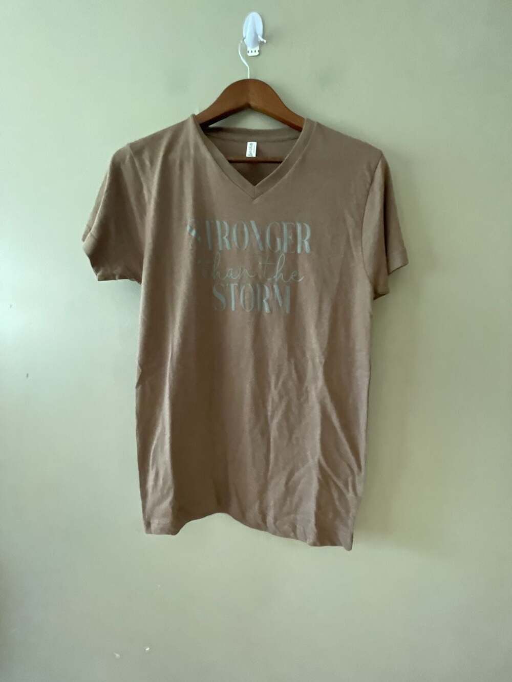 Love in Faith Stronger Than the Storm Women's V-Neck Graphic Tee Size S Taupe